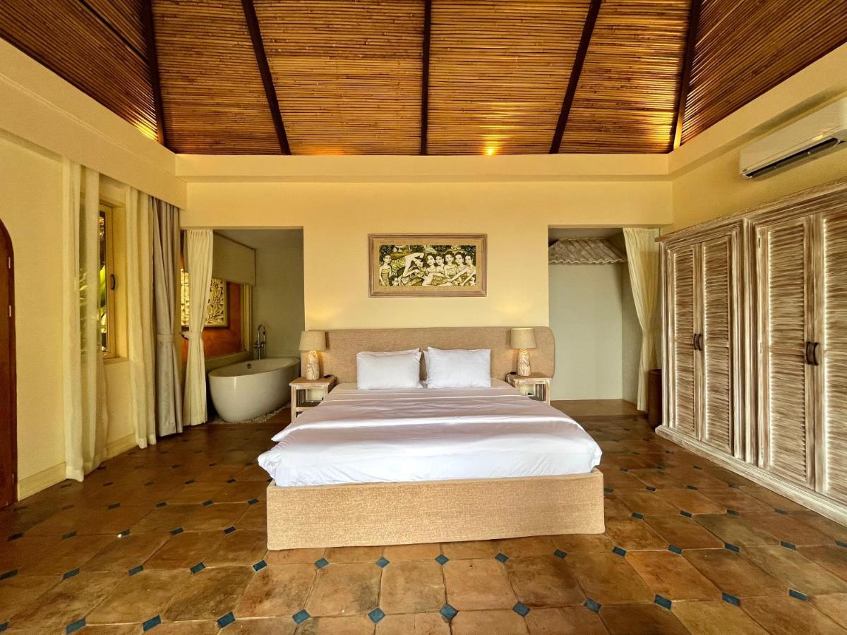 Coco Grove Beach Resort, Siquijor Island エクステリア 写真 A bedroom at the resort