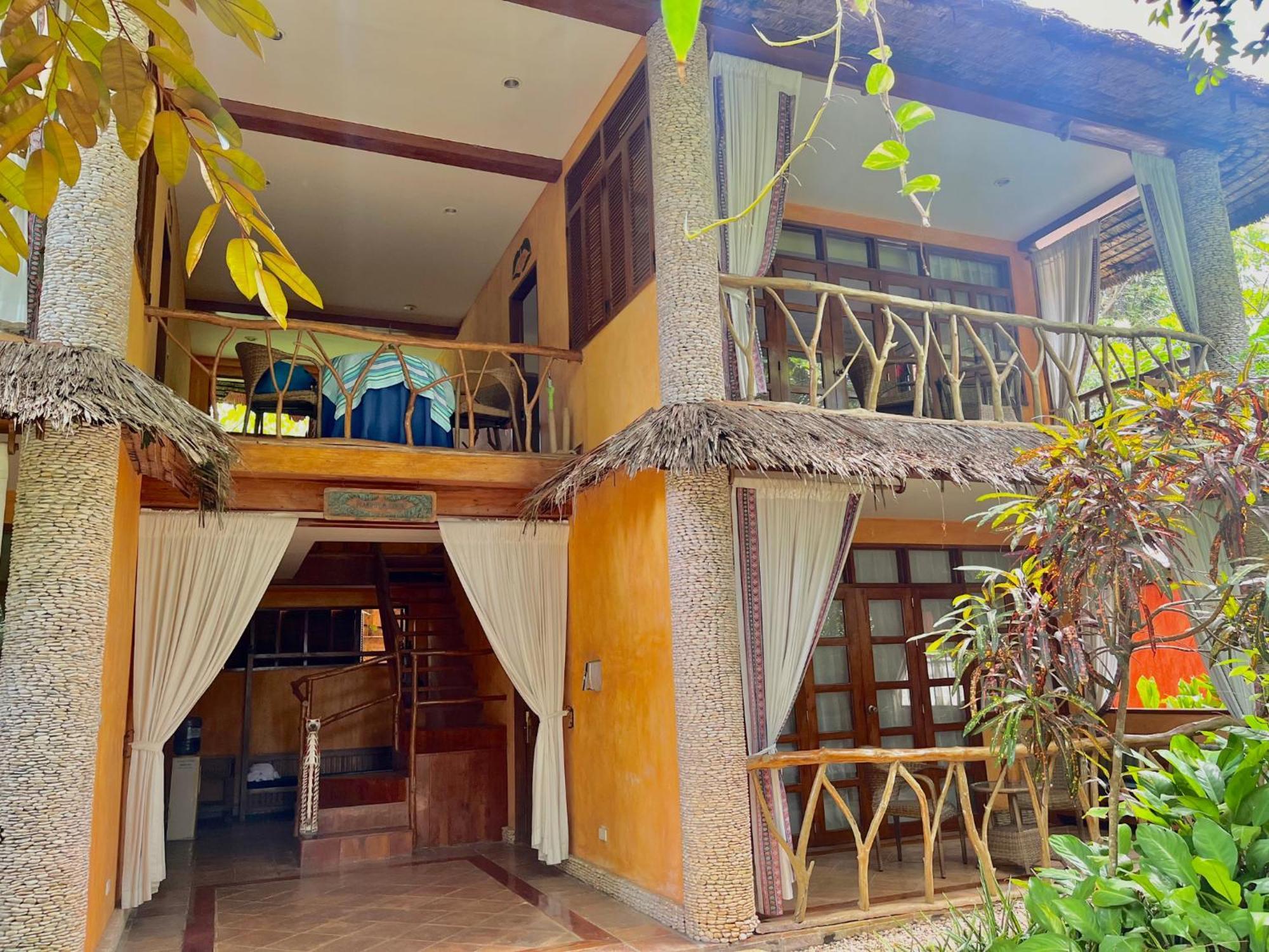 Coco Grove Beach Resort, Siquijor Island エクステリア 写真 A villa at the resort